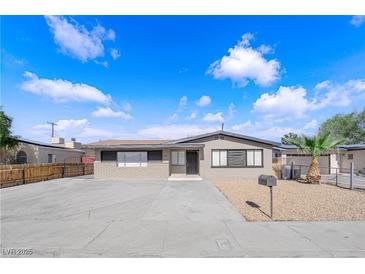 Charming single-story home with a concrete driveway and a low-maintenance yard at 364 Upland Blvd, Las Vegas, NV 89107