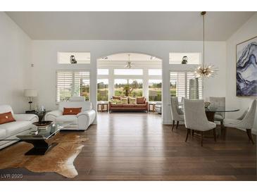 Bright living room featuring hardwood floors and abundant natural light at 2729 Echo Mesa Dr, Las Vegas, NV 89134