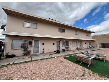 Multi-Gathering property featuring a two-story building with multiple units and outdoor seating area at 2804 Marlin Ave, Las Vegas, NV 89101