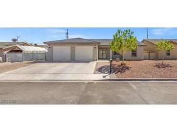 Charming home with well-maintained desert landscaping and a two-car garage at 4669 E Saint Louis Ave, Las Vegas, NV 89104