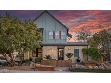 Charming two-story home with stone accents and professionally landscaped front yard at 3069 Lascari Ave, Henderson, NV 89044