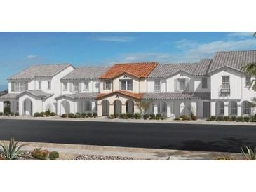 Beautiful new home exteriors, featuring desert landscaping and a terracotta roof at 3759 Via Allegro, Henderson, NV 89044