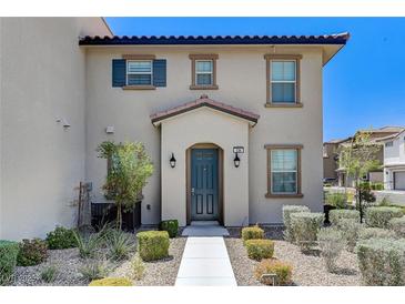 Charming two-story home with a well-maintained landscaped front yard and inviting entrance at 134 Lomita Heights Dr, Las Vegas, NV 89138