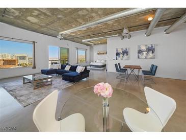 Bright and airy living room featuring modern decor, large windows, and an open floor plan at 900 Las Vegas Blvd # 903, Las Vegas, NV 89101