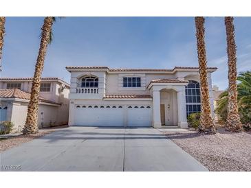 Charming two-story home featuring a three-car garage and a well-maintained, inviting exterior at 9776 Whitewater Canyon Ct, Las Vegas, NV 89183