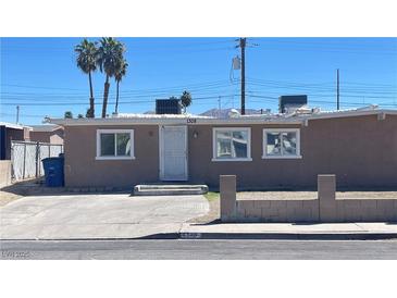 Charming single-story home featuring a well-maintained front yard and classic design at 1308 Harriet St, Las Vegas, NV 89101
