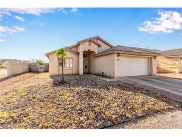 Charming single-story home with desert landscaping and a two-car garage at 5019 Cactus Mesa Way, North Las Vegas, NV 89031