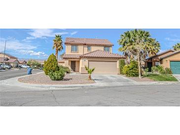 Charming two-story home featuring desert landscaping and a spacious two car garage at 6586 Mount Roy Ln, Las Vegas, NV 89156