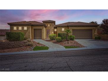 Stunning single-story home with two-car garage, tile roof, and desert landscaping at 2116 Burtonsville Dr, Henderson, NV 89044