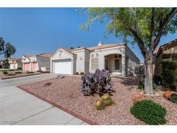 Charming single story home with two car garage and desert landscaping at 7828 Morning Flower Ln, Las Vegas, NV 89129