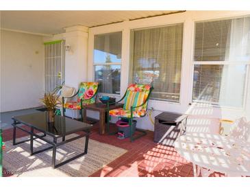 Relaxing covered patio with comfortable seating and bright, natural light at 2801 Peggy Ave, Pahrump, NV 89048