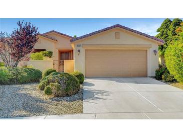 Charming single-story home with a well-maintained front yard and a two-car garage at 5327 Progresso St, Las Vegas, NV 89135
