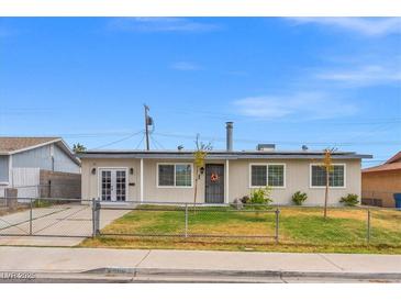 Charming single-story home featuring a well-maintained front yard and a classic design at 6508 Bourbon Way, Las Vegas, NV 89107