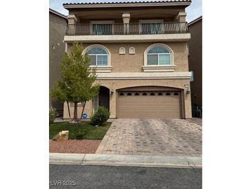 Charming two-story home features a second-floor balcony and a spacious two-car garage at 6516 Austin Hope Ave, Las Vegas, NV 89118