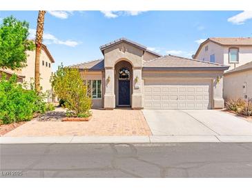 Charming single-story home featuring desert landscaping and a welcoming entrance at 5752 Shermer Ct, Las Vegas, NV 89120