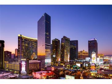Striking skyline view of the Las Vegas strip at twilight featuring illuminated buildings and signage at 3750 Las Vegas Blvd # 3008, Las Vegas, NV 89158