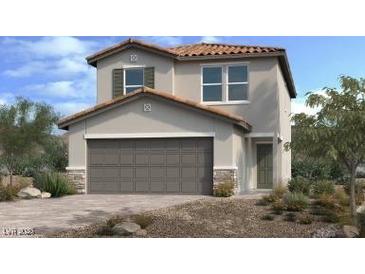 Beautiful two-story home with a two car garage, desert landscaping, and a tile roof at 4145 Texas Lilac Ave, Las Vegas, NV 89139