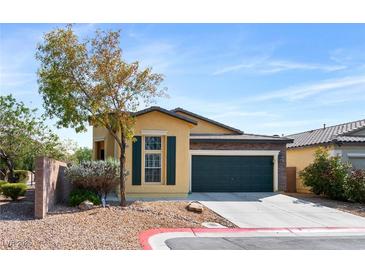 Charming single-story home featuring a two-car garage and a well-maintained front yard with desert landscaping at 7348 Zion Falls St, Las Vegas, NV 89131