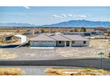 Sprawling desert property with detached garage and mountain views at 881 W Kathryn Ave, Pahrump, NV 89060