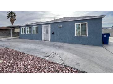 Charming exterior view of a home, featuring a well-maintained yard and a classic design at 524 Bedford Rd, Las Vegas, NV 89107