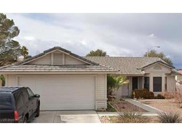 Charming single-story home with a two car garage and well-maintained front yard at 149 Cologne Ct, Henderson, NV 89074