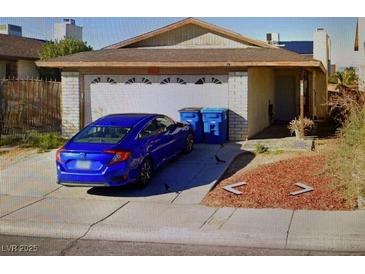 Charming one-story home featuring a spacious two-car garage and low maintenance landscaping at 7732 Blackbird Ave, Las Vegas, NV 89145