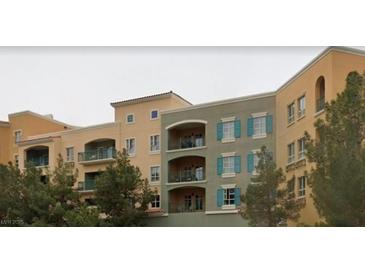 Multi-story apartment building featuring patios and balconies at 30 Strada Di Villaggio # 631, Henderson, NV 89011