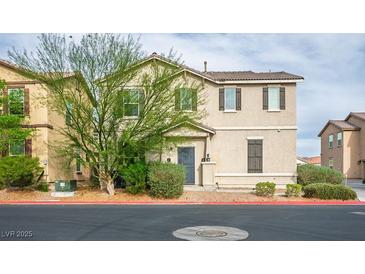 Charming two-story home showcasing a well-maintained exterior with neutral tones and complementing dark shutters at 4610 Lime Straight Dr, Las Vegas, NV 89115
