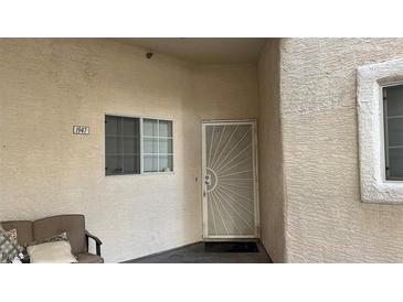 Welcoming entrance with security door and visible address number at 1947 Cutlass Dr # 0, Henderson, NV 89014