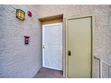 Exterior view of the entry door featuring a decorative security gate at 2008 Mesquite Ln # 305, Laughlin, NV 89029