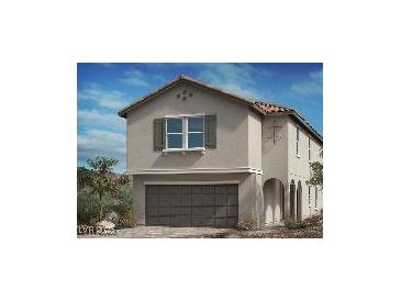 Charming two-story home with a traditional design, attached garage, and beautiful architectural details at 10032 Indy Rey Ct, Las Vegas, NV 89148