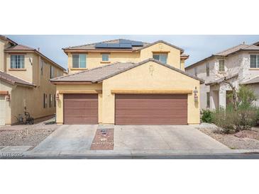 Charming two-story home with a large two car garage and driveway at 4440 Pacific Crest Ave, Las Vegas, NV 89115