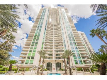 Stunning high-rise featuring a pool, lush landscaping, and inviting common areas at 2747 Paradise Rd # 2606, Las Vegas, NV 89109