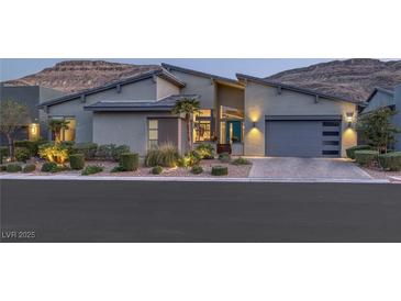 Charming single-story home with a modern design, well-maintained landscaping, and a convenient two-car garage at 10271 Meridian Hill Ave, Las Vegas, NV 89135