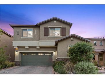Charming two-story home with a well-manicured yard and a convenient two-car garage at 3268 Grayson Lake Ct, Las Vegas, NV 89129