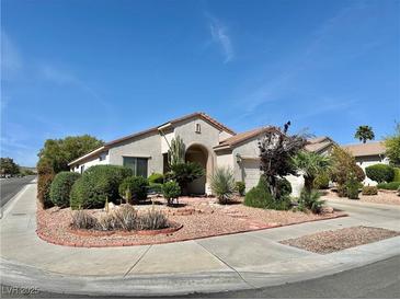 Charming single-story home with well-manicured front yard and desert landscaping at 1977 High Mesa Dr, Henderson, NV 89012