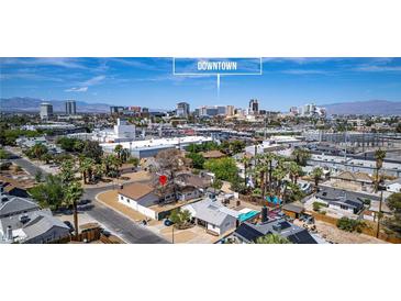 Charming home featuring downtown views and a refreshing pool in a desirable neighborhood at 1400 Cottonwood Pl, Las Vegas, NV 89104