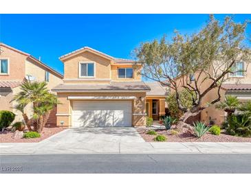 Charming two-story home with desert landscaping, two-car garage, and a welcoming facade under a clear blue sky at 7012 Mercurio Ave, Las Vegas, NV 89131