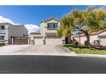 Charming two-story home with a three-car garage and well-maintained landscaping at 8073 Villa Pulido St, Las Vegas, NV 89131