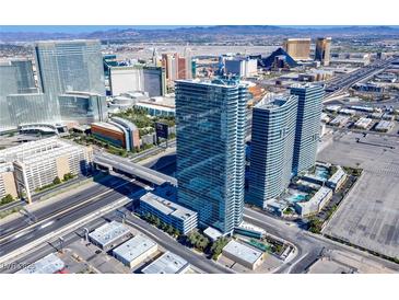 A stunning aerial view of The Martin condominium towers overlooking the Las Vegas skyline at 4471 Dean Martin Dr # 1707, Las Vegas, NV 89103