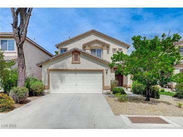 Charming two-story home with well-maintained landscaping and a two-car garage at 9264 Ansley Ct, Las Vegas, NV 89148