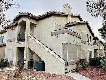 Multi-Gathering stucco building featuring a staircase and outdoor access to each level at , Las Vegas, NV 89122