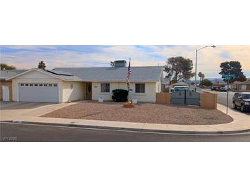 Charming single-story home featuring a low-maintenance yard and an attached two-car garage at 5268 Gains Mill St, Las Vegas, NV 89122