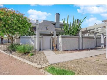 Charming townhome with a private courtyard, xeriscape landscaping, and a freshly painted exterior at 5526 Orchard Ln # 0, Las Vegas, NV 89110