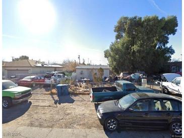 Exterior view showing the surrounding neighborhood and a variety of parked vehicles at 2520 Sunrise St, Las Vegas, NV 89101