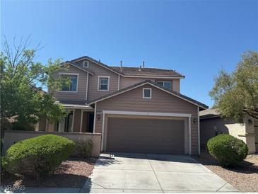 Charming two-story home featuring a two-car garage and well-maintained landscaping at 10793 Wallflower Ave, Las Vegas, NV 89135