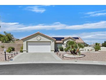 Charming single-story home featuring a well-maintained front yard and a two-car garage at 3109 Hawksdale Dr, Las Vegas, NV 89134
