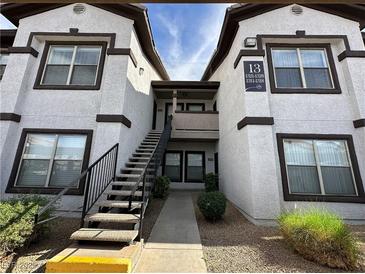 Well-maintained two-story condominium complex featuring easy stair access to upper-level units at 45 Maleena Mesa St # 1321, Henderson, NV 89074