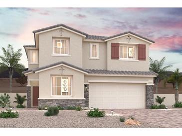 Charming two-story home featuring a neutral color palette, stone accents, and a well-manicured desert landscape at 5136 Eagle Way, North Las Vegas, NV 89031
