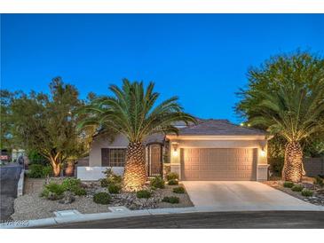 Charming single-story home with a well-manicured front yard and a two-car garage at 2248 Carrizo Way, Henderson, NV 89052
